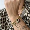 Bracelet en acier inoxydable avec breloques